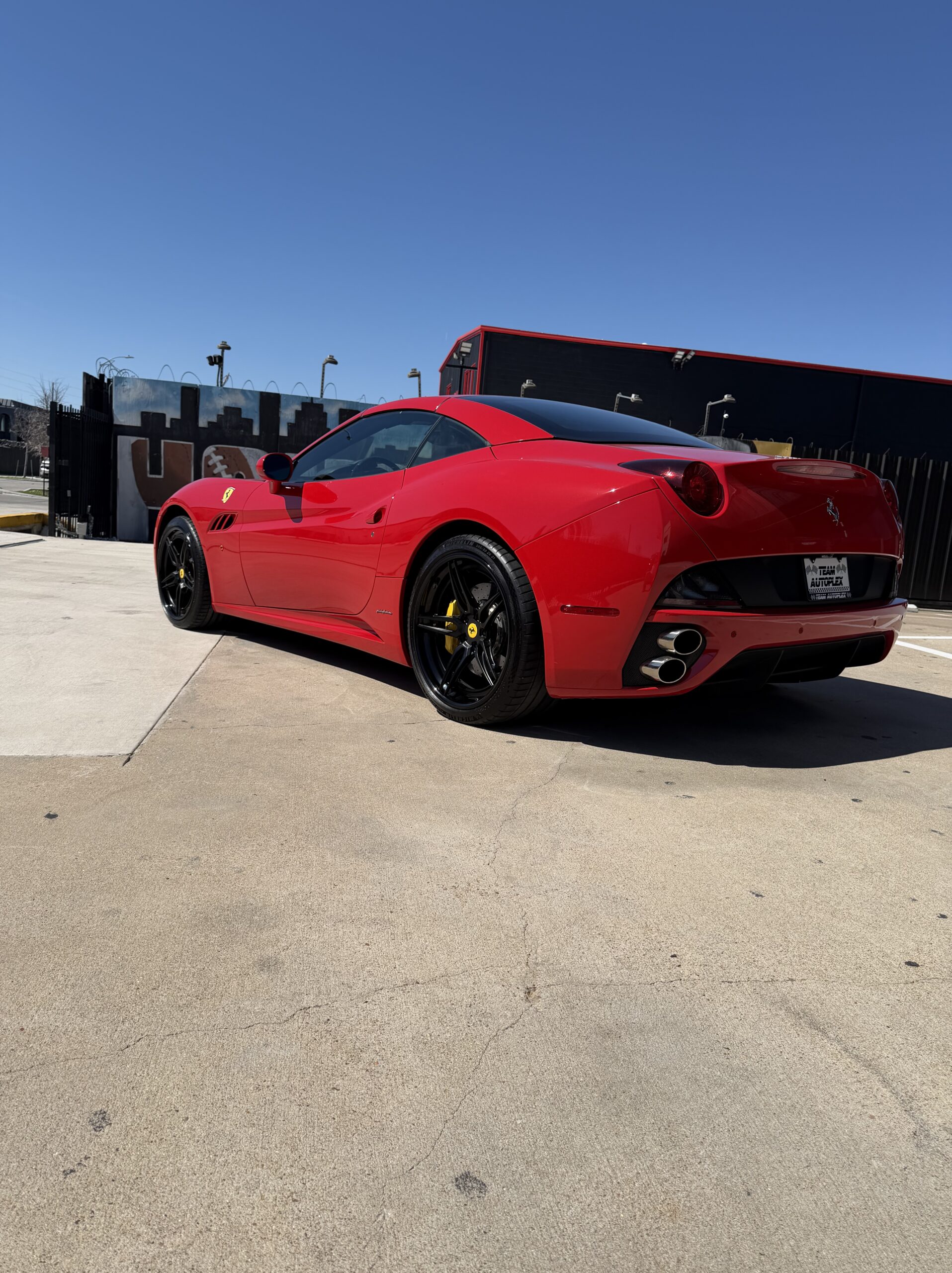 Featured vehicle wrapped in red finish